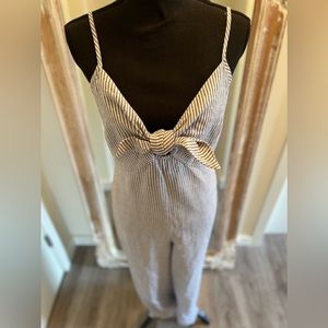 Blue and white striped jumpsuit, size medium